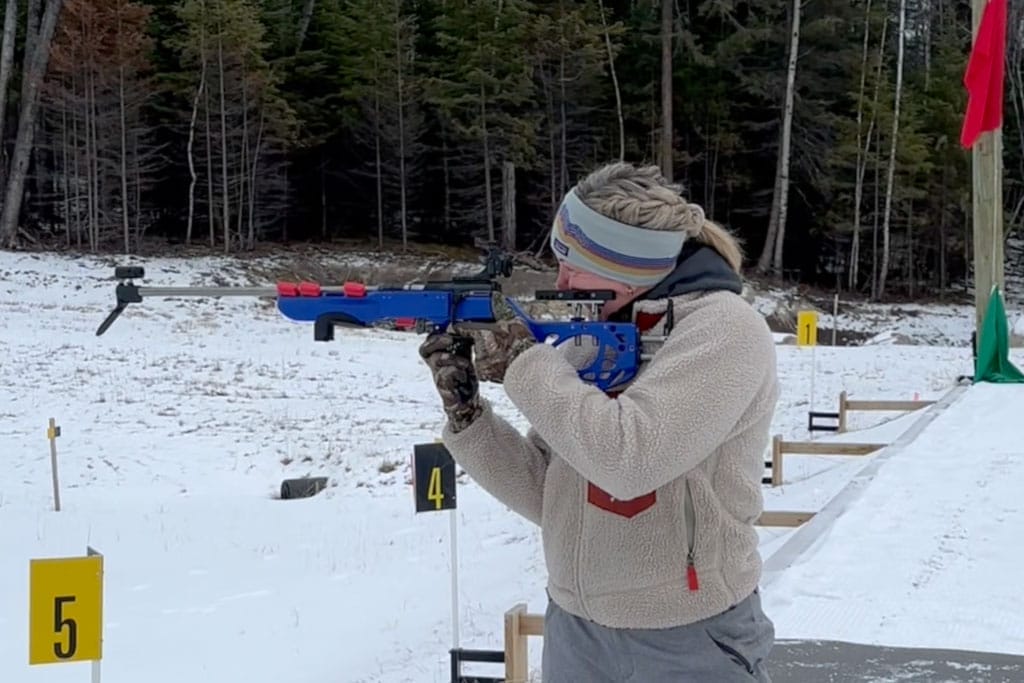 A novice biathlete practices at a rifle range in Kenora.